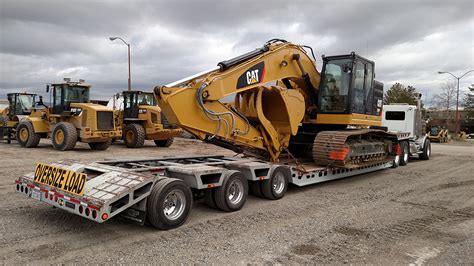 how to unload excavators from trailer